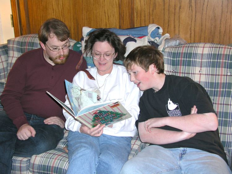 Mama reads "The Night Before Christmas" to her boys