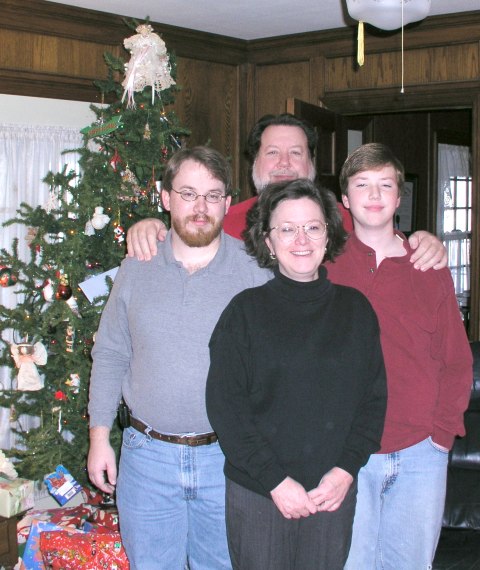 Nathan, Joe, Natalee, and Samuel Reed on Christmas morning 2004