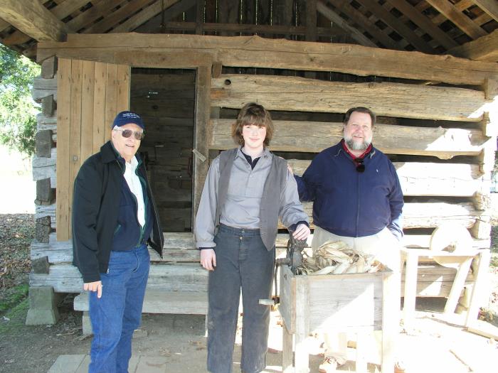 Jim, Samuel, and Joe at the corn crib