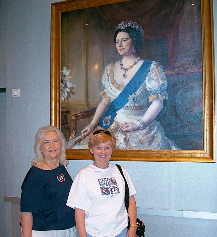 Alice and Carol with the portrait of Queen Mary II