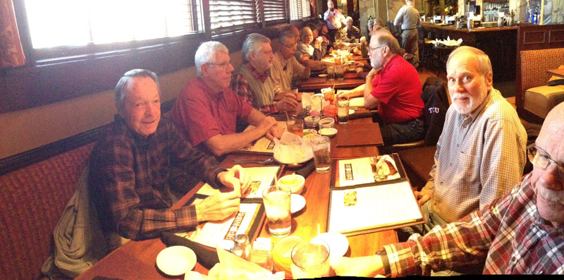 Clockwise around the table starting at left: Dave Kuester, Jim Rushing, Larry Pavlicek, Bob Everett, Rod Barnes, Norma Barnes, Harold Shiroma, Amy Gehr and son Josh, Jim Harrison standing, Red Merrit, and on the right side, Jerry Brown,  Mike Crye, and John Plant