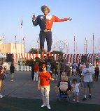 It's Hsu Whey's first time at the fair, and a picture with Big Tex was obligatory