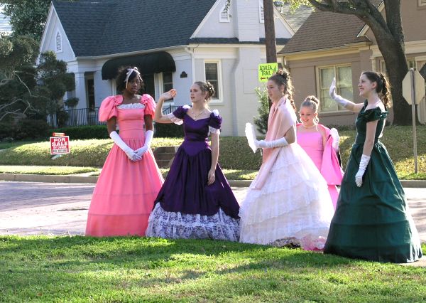 Tyler belles in period costume welcome visitors