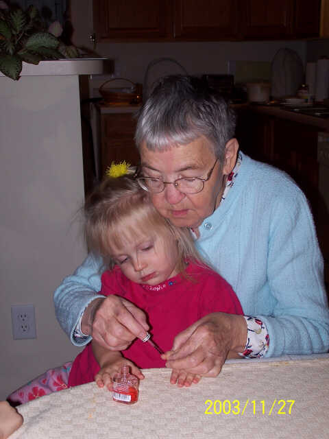 Getting our fingernails painted by Great Grandmother Ruth
