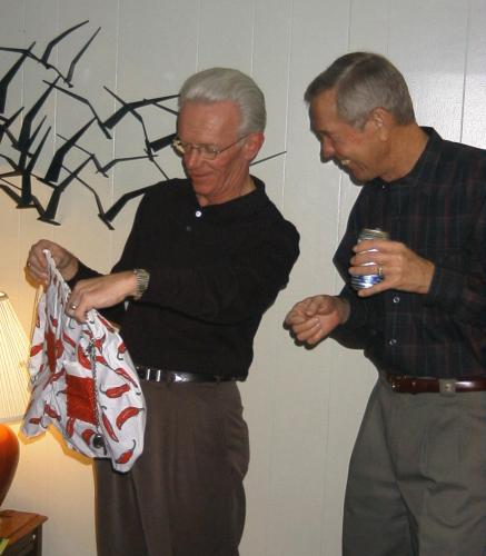 Jimmy presents Dennis with some custom "Seat Covers"