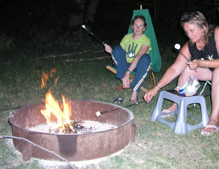 Roasting marshmallows over the camp fire