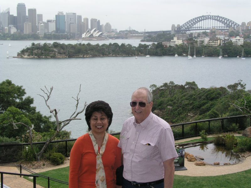 Angie and Jim Harrison at the Toranga Zoo with Sydney in the background